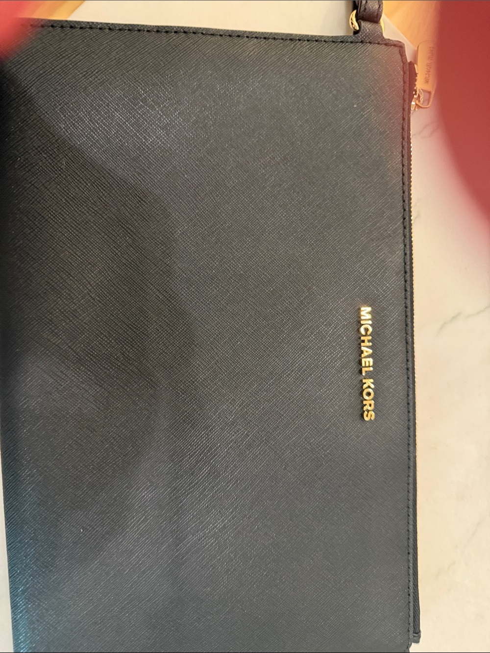 Michael Kors Women’s Black Clutch Purse with Gold Logo Accent